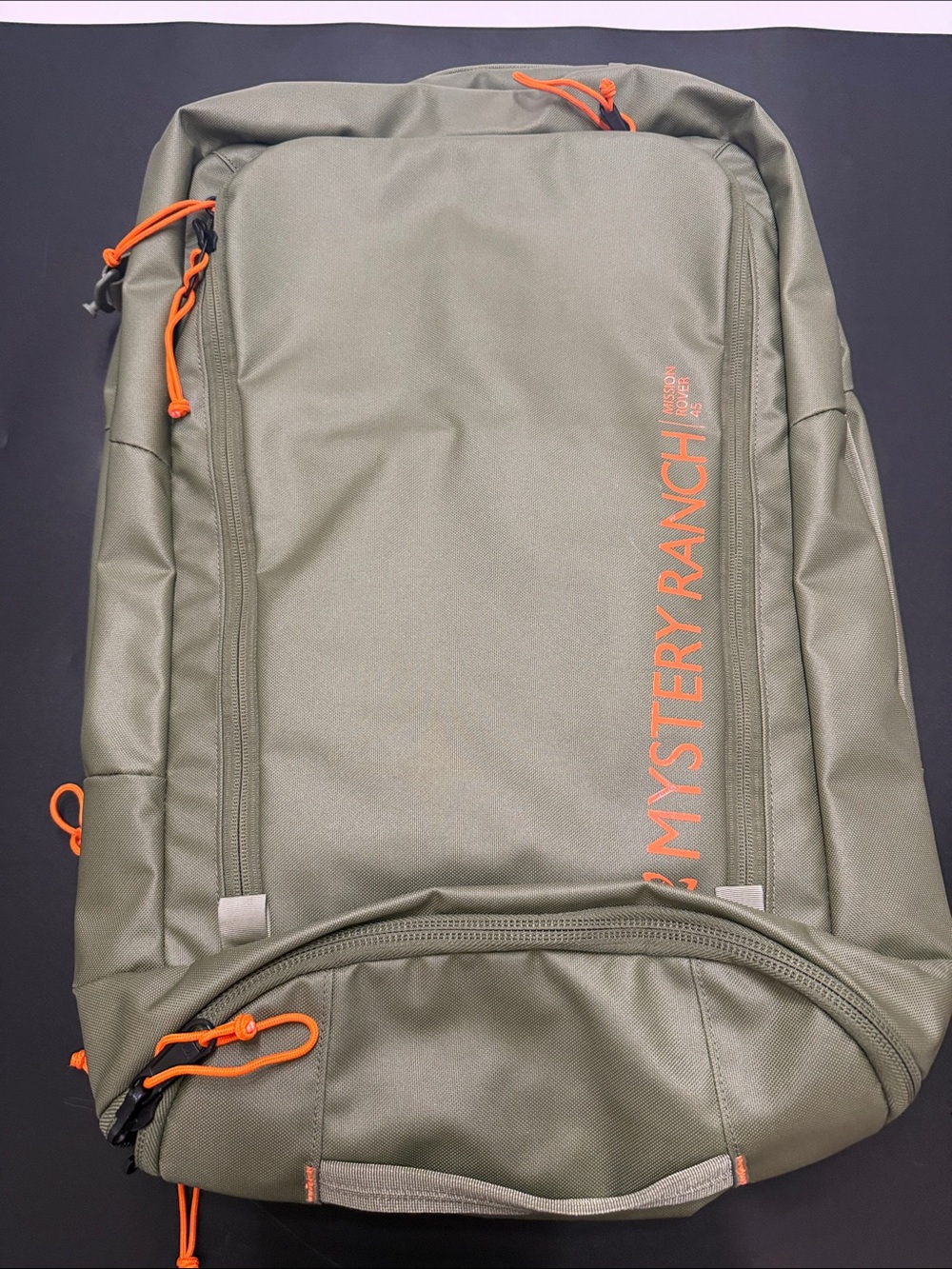 MYSTERY RANCH Olive Green Backpack with Orange Accents